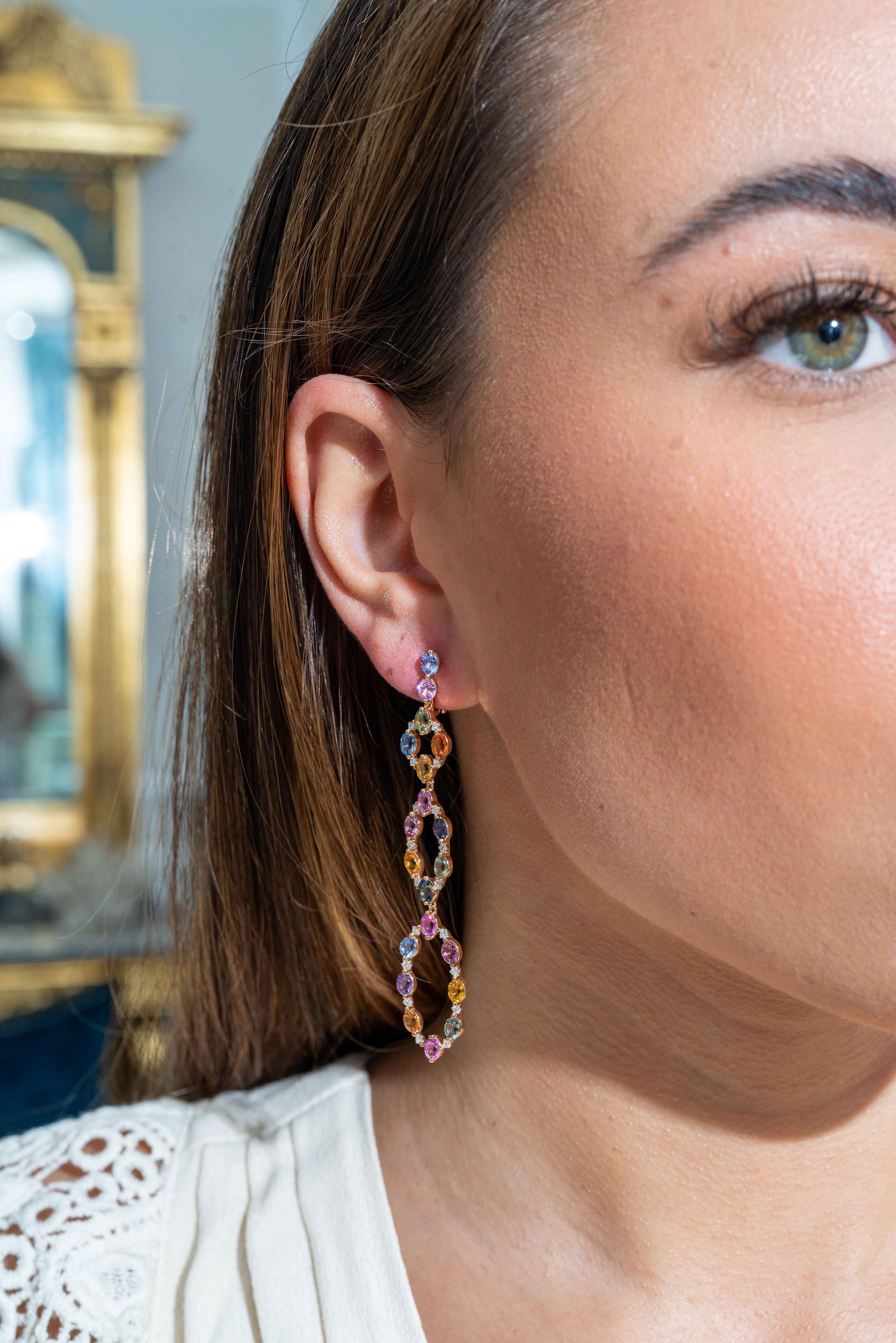 This 18K rose gold elegant chandelier earrings are from our Riad collection. These alluring earrings are made of multi-coloured sapphires in total of 9.95 Carat and natural white diamonds in total of 0.62 Carat. The total metal weight is 8.39 gr.