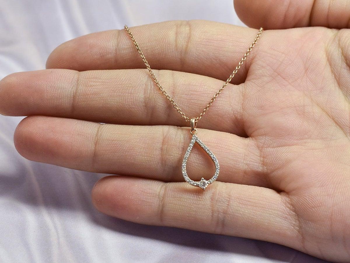 Modern 18 Karat Rose Gold Diamond Pear Necklace For Sale