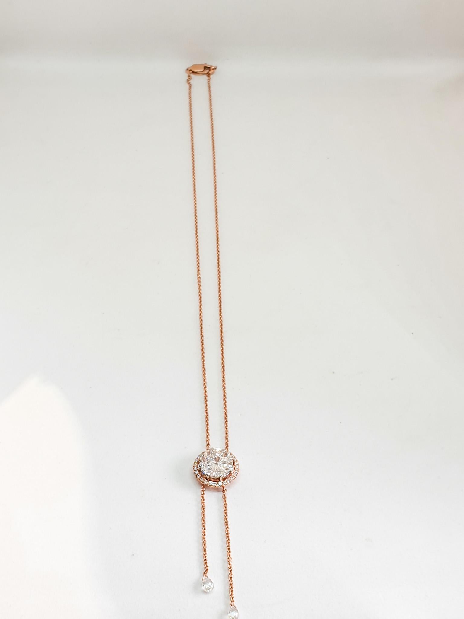 A composite set round center meticulously crafted in 18 karat rose gold along with the periphery of small brilliant cut round diamonds & hand made chain complete this modern pendant necklace.
This pendant necklace would make a very casual chic day