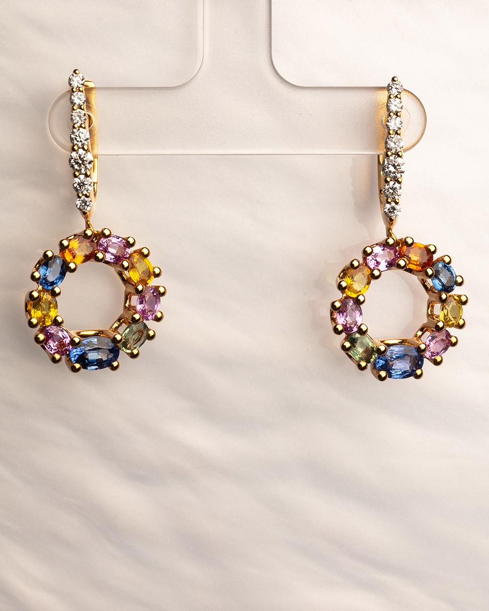 Taille ovale Boucles d'oreilles pendantes en or rose 18 carats avec diamants et saphirs en vente
