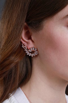 18 Karat Rose Gold Diamond Swirl Earrings