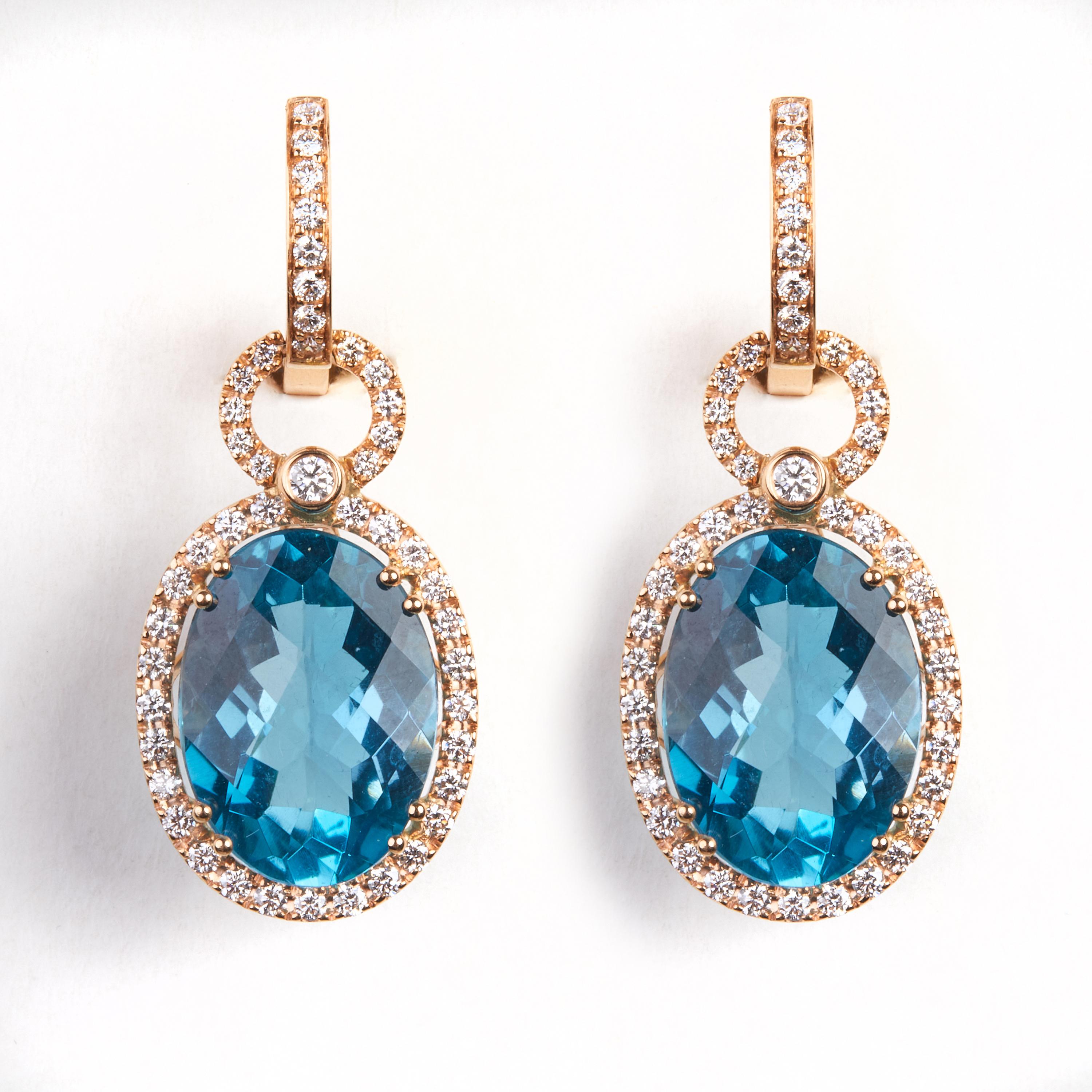 18 Karat Rose Gold  Diamons and Topaz Dangle Earrings

92 Diamonds 1.24 ct
2 Topaz Royal 27.20 ct.








Founded in 1974, Gianni Lazzaro is a family-owned jewelery company based out of Düsseldorf, Germany.
Although rooted in Germany, Gianni