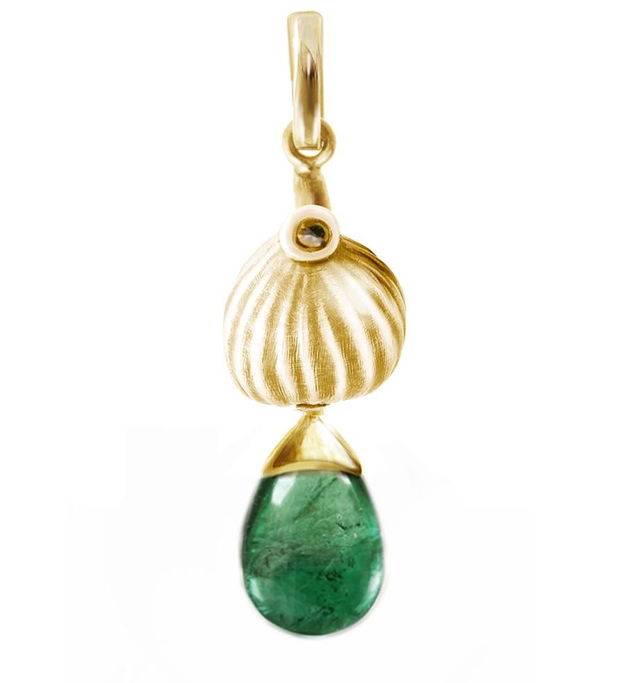 This contemporary drop pendant necklace is made of 18 karat rose gold and features a natural emerald that measures 9.5x7x6 mm and weighs 2.79 carats, as well as a round diamond. The Fig collection was featured in a review by Vogue UA and was