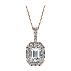 Pendentif en or rose 18 carats avec halo d'émeraudes et diamants de 1/2 carat