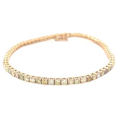 Pulsera de tenis con diamantes fantasía en oro rosa de 18 quilates