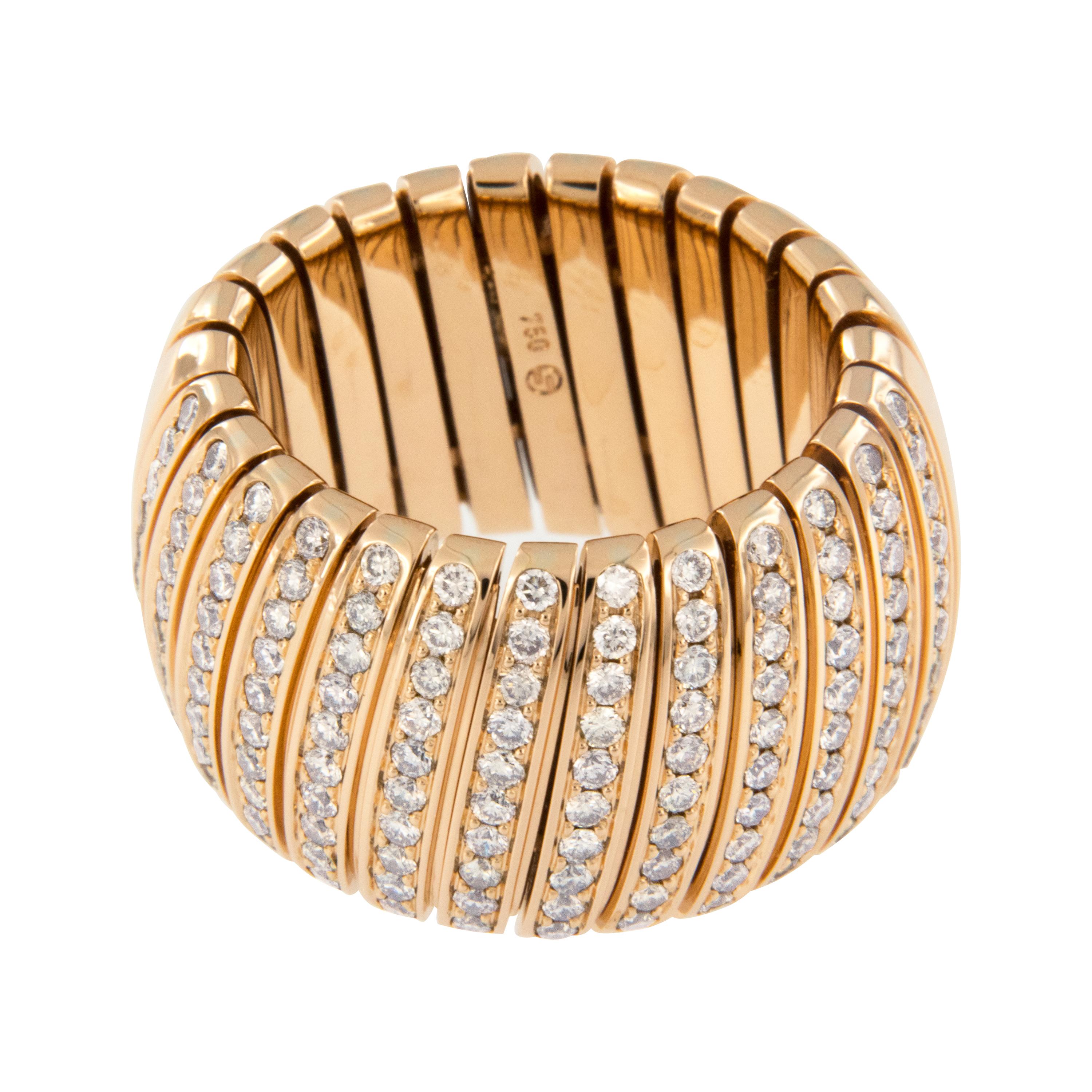 Since 1976, optimal quality and up-to-date design have always been the principles behind Scheffel-Schmuck. The superb German craftsmanship of this flexible wide band in 18 karat soft royal rose gold is further accentuated with 0.62 Cttw of fine