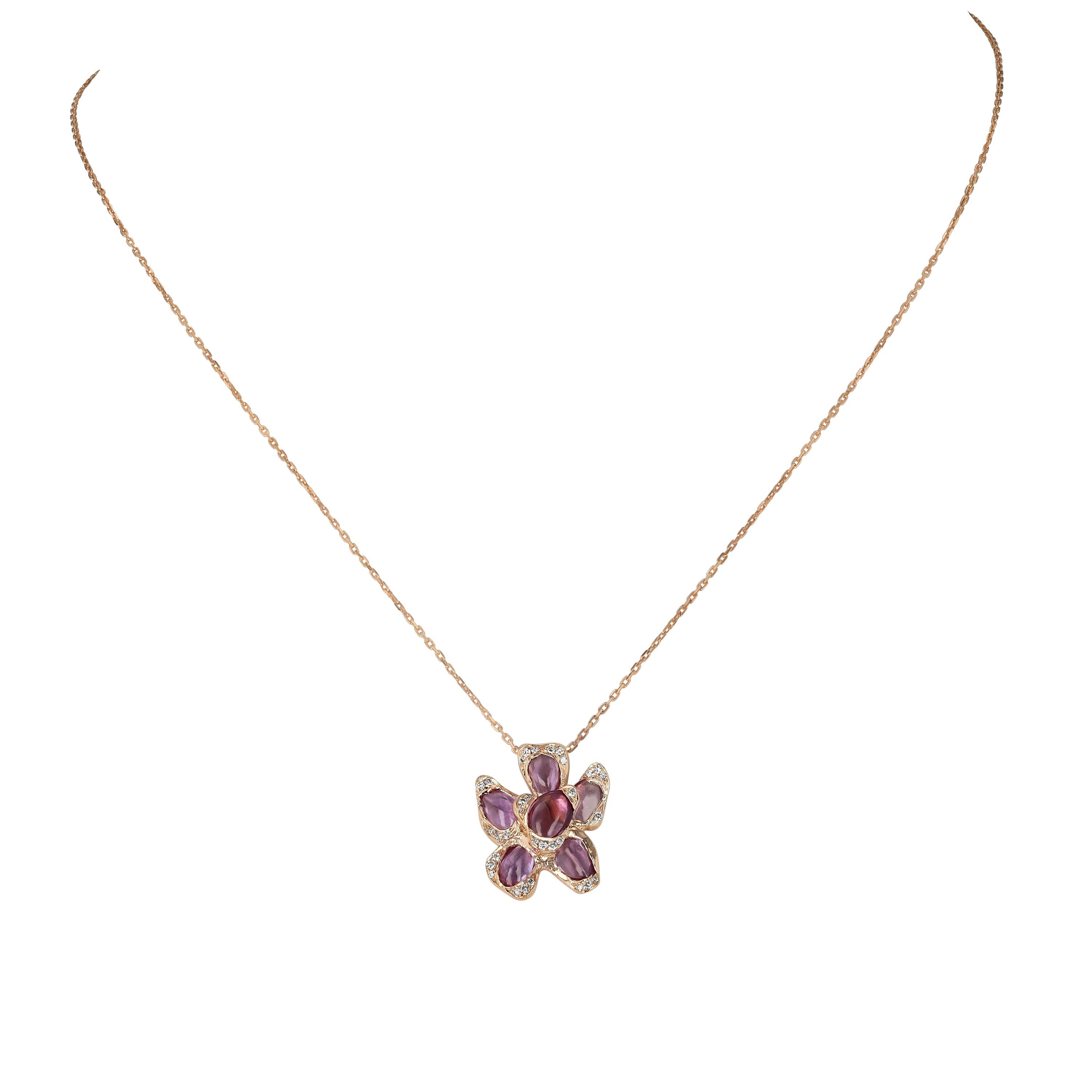 With both pink sapphires and rose gold, this flower pendant captures a magnificent glow that seamlessly shines. The pink sapphire pendant is a signature piece accented by flawless diamonds.  You just cannot take your eyes off this incredible gold