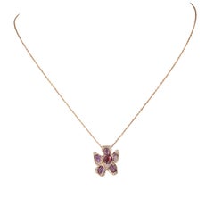 Ciondolo a forma di fiore in oro rosa 18 carati con zaffiri rosa