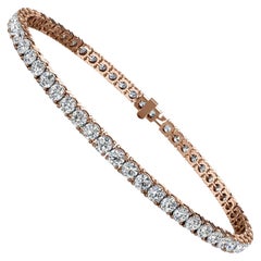 Bracelet tennis à quatre griffes en or rose 18 carats et diamants de 5 carats