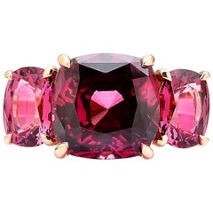 18 Karat Rose Gold Garnet Ring with Champagne Diamonds