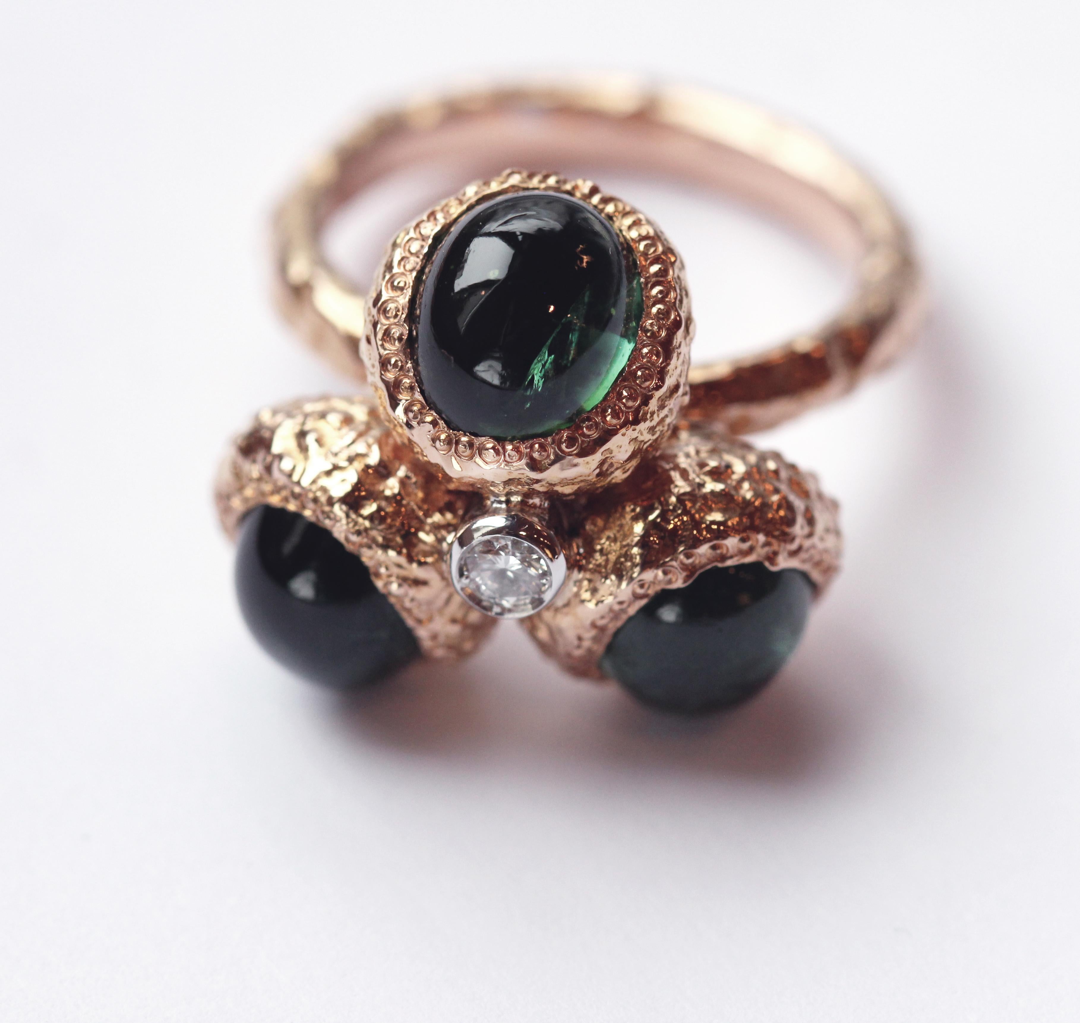 Three Stone green Tourmaline Cabochon Ring; design inspired to the Iconic Federica Rettore sea urchin texture theeme  a characteristic of her collection. the style is in 18 Karat Rose Gold gr. 15,05;  Diamond Carat 0,07; Cabochon Tourmaline Carat