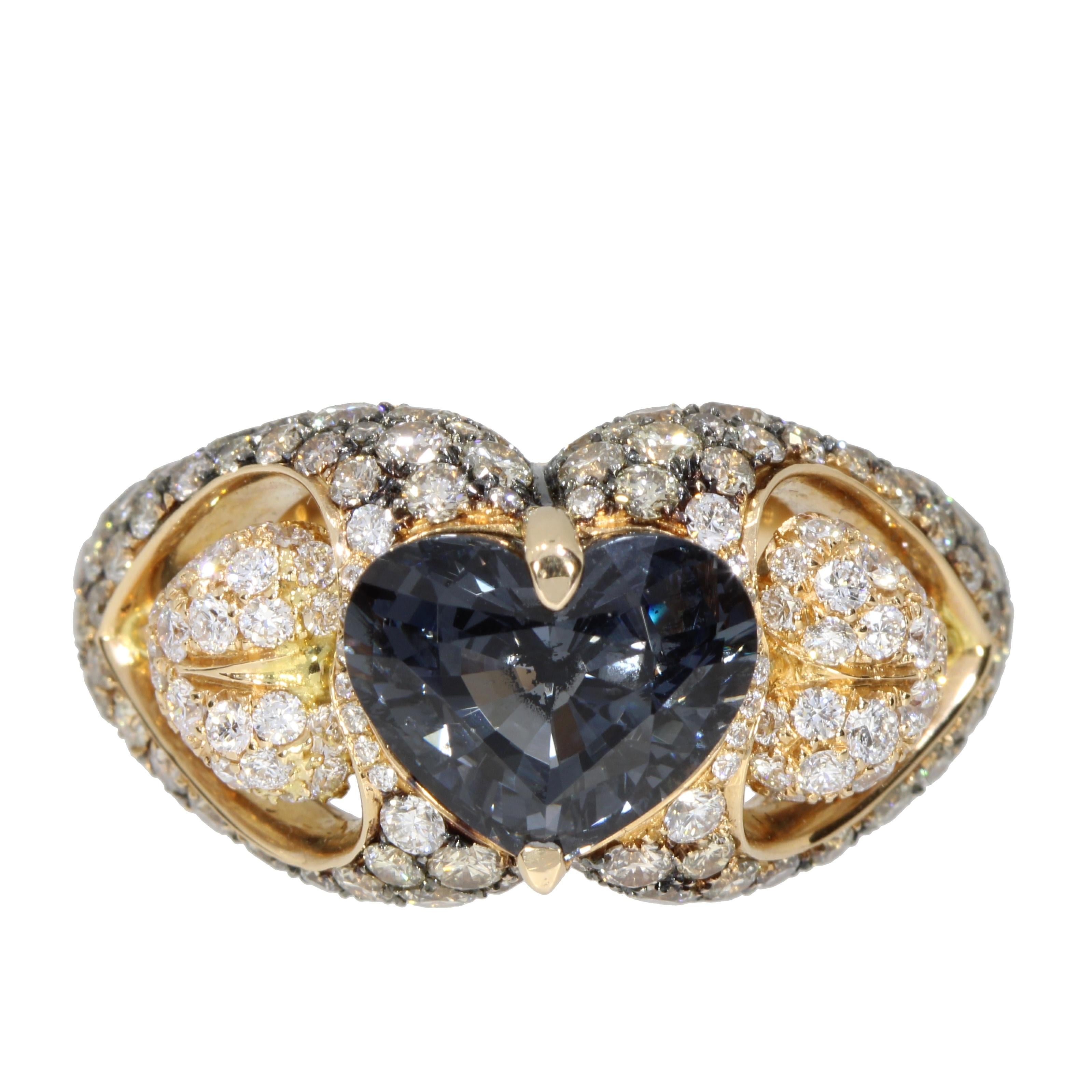 A captivating Blue Grey heart Spinel is the centre of two White diamonds pave hearts suspended ..... the hearts are surrounded by a glittering pave of black diamonds stones

This ring is an original new engagement ring but also the perfect present