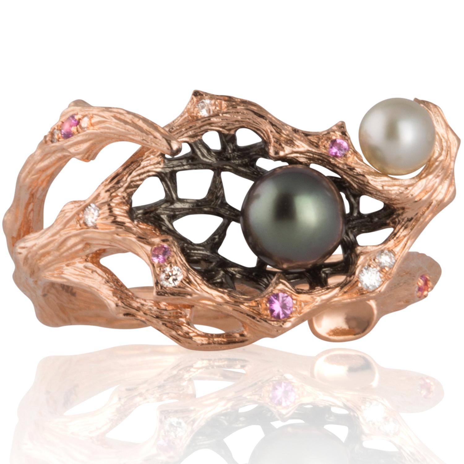 Capturing the creative magic of metamorphosis, this 18K rose gold ring is inspired by the fruits of nature. Polished and decadent rare south sea keshi pearls are surrounded by petite pink sapphires and fine diamonds in a bold design that