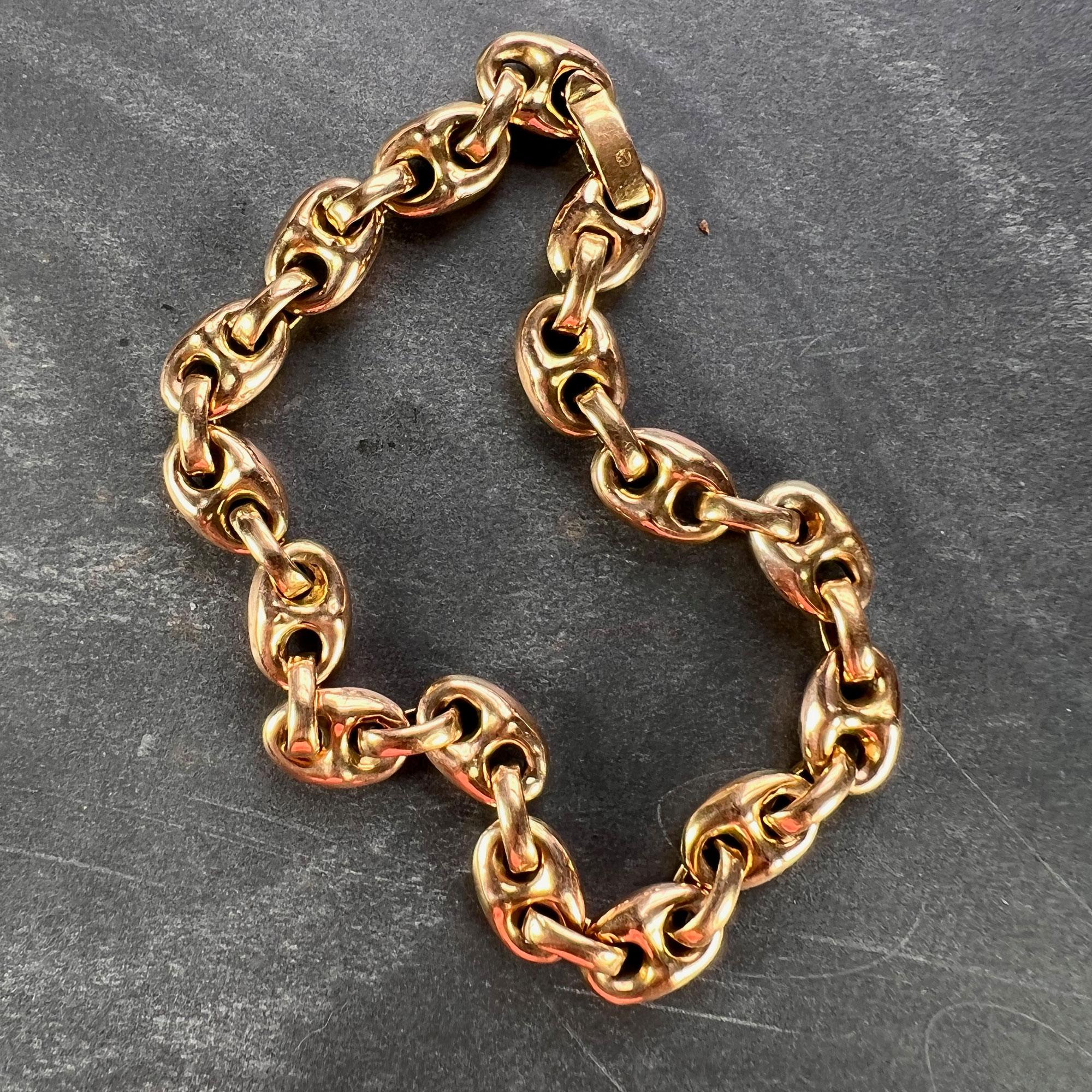 An 18 karat (18K) rose gold mariner link bracelet. Stamped with the owl for 18 karat gold and French import. 8 inches long. 

Dimensions: 19 x 0.8 x 0.5 cm
Weight: 10.59 grams 
