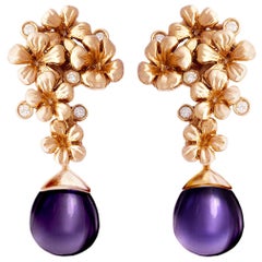 Boucles d'oreilles cocktail modernes en or rose 18 carats en forme de fleur de prune avec diamants