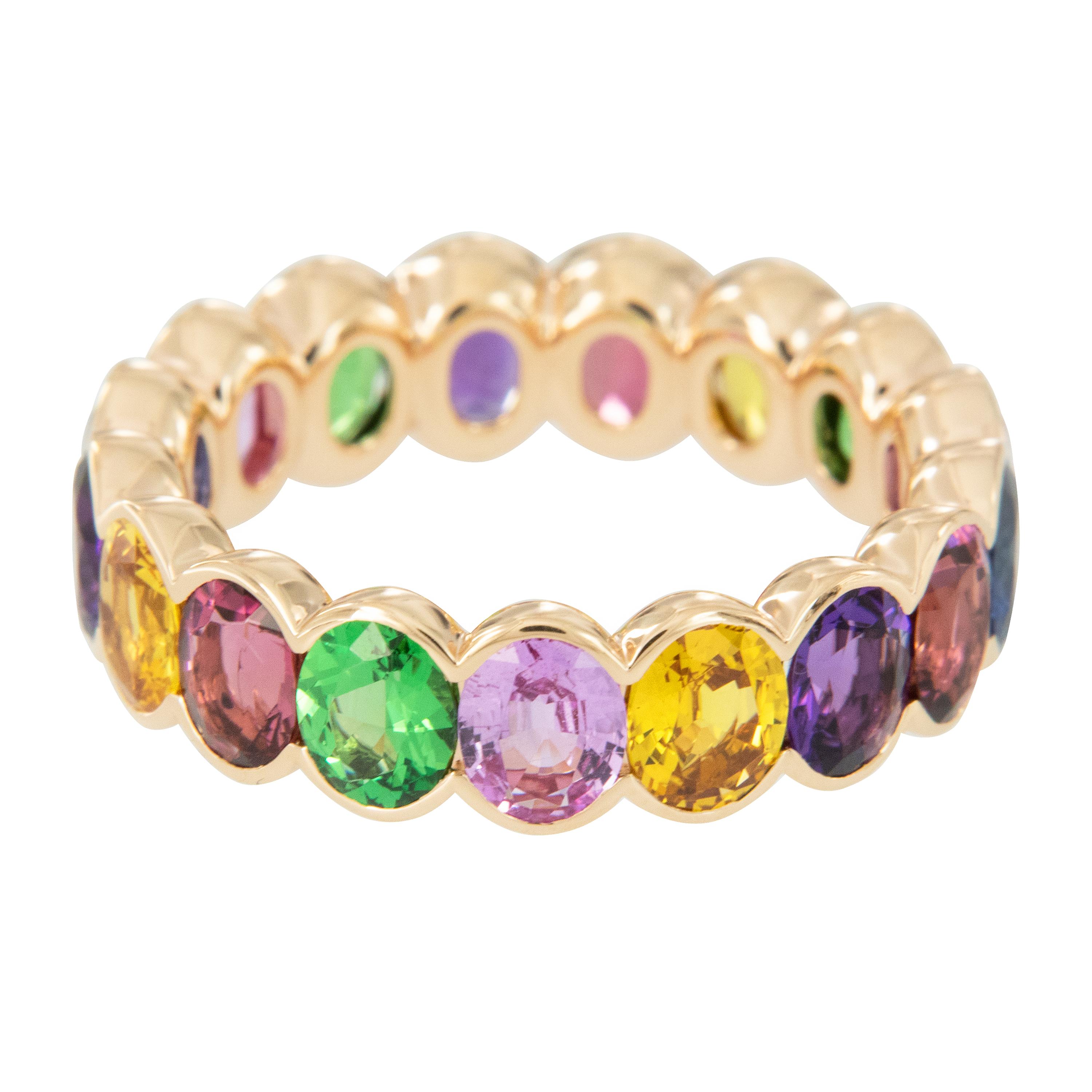 What is more beautiful than a perfect rainbow after a storm? This ring was created in alluring rose gold and has 4.64 Cttw. of oval multi colored sapphires, tsavorites & rubelites and is a size 6.5. Be the lucky wearer of this ring and you will