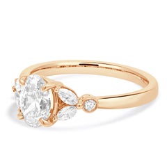 18 Karat Rose Gold Oval Diamond Engagement Ring