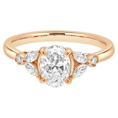 18 Karat Rose Gold Oval Diamond Engagement Ring