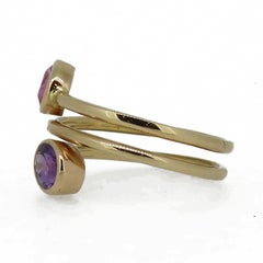 18 Karat Rose Gold Oval Pink and Purple Sapphire Two-Stone Cross Over Ring
