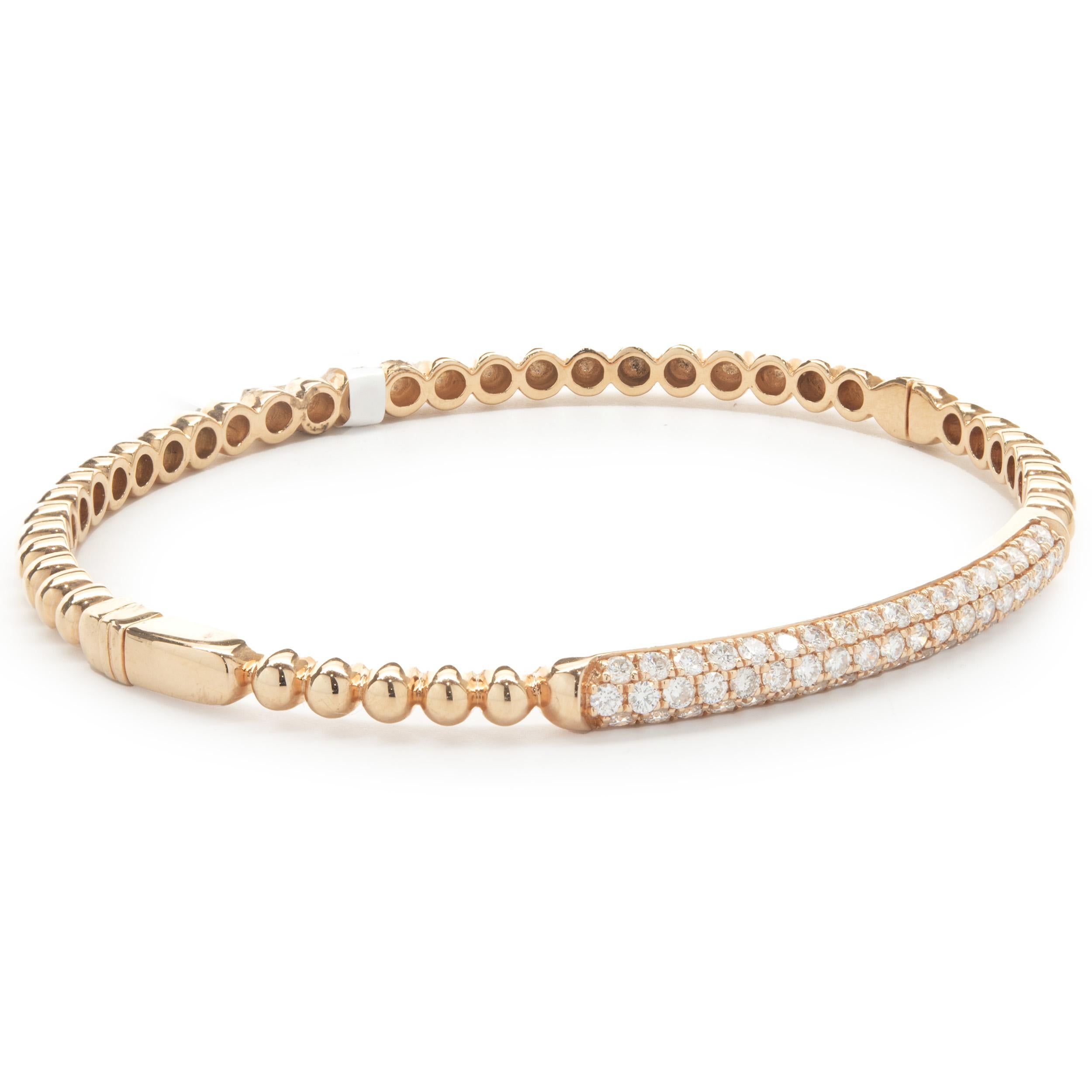 Designer: custom design
Material: 18K rose gold
Diamonds: 55 round brilliant cut = 1.06cttw
Color: G
Clarity: VS1-2
Dimensions: bracelet will fit up to a 6.75-inch wrist
Weight: 13.62 grams