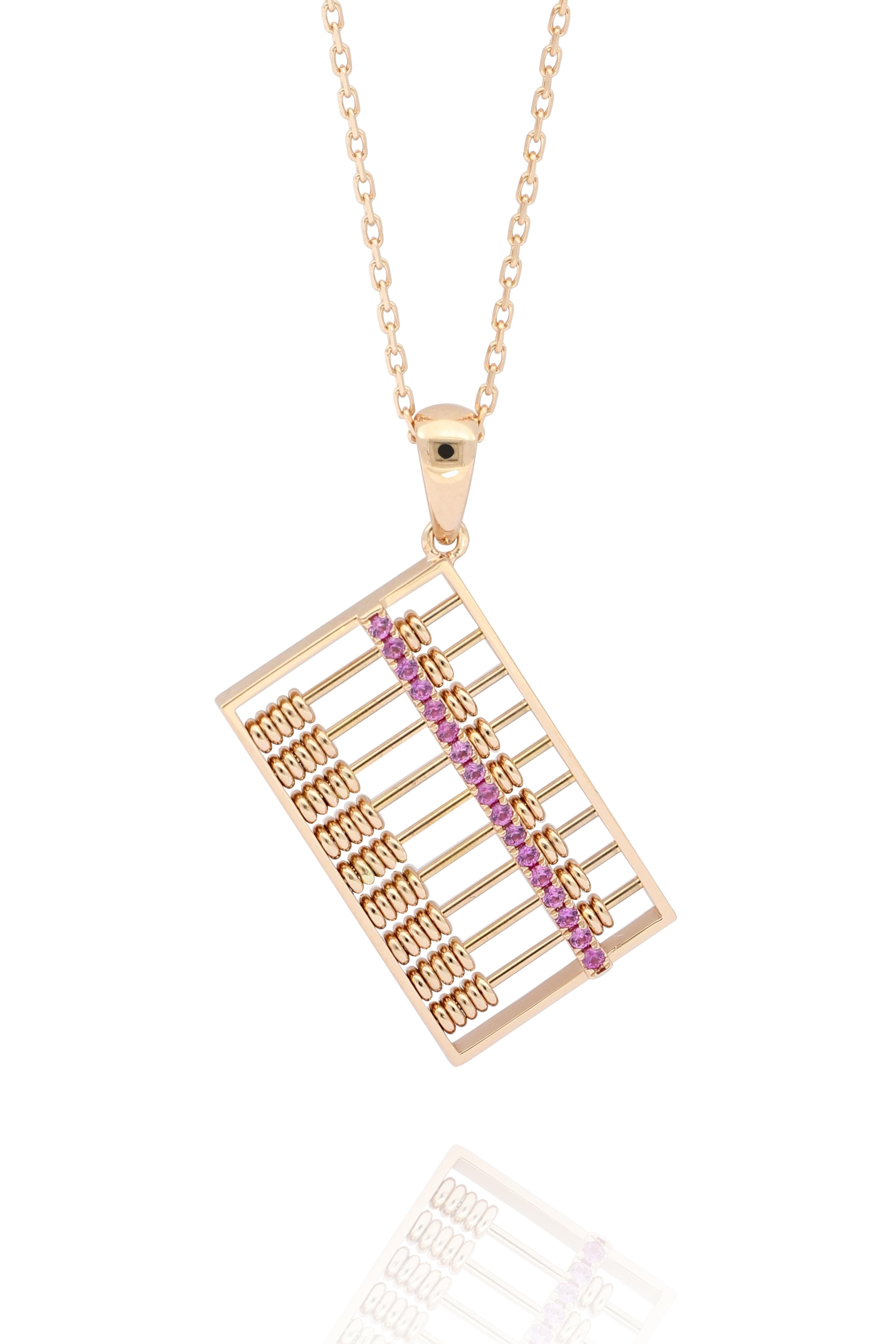 Abacus pendant with moving beads, decorated with a row of pink sapphire weighting 0.11 carats, mounted in 18 Karat rose gold.
Abacus, invented in ancient China  more than 2,600 years ago, is a traditional computing tool for businesses and widely