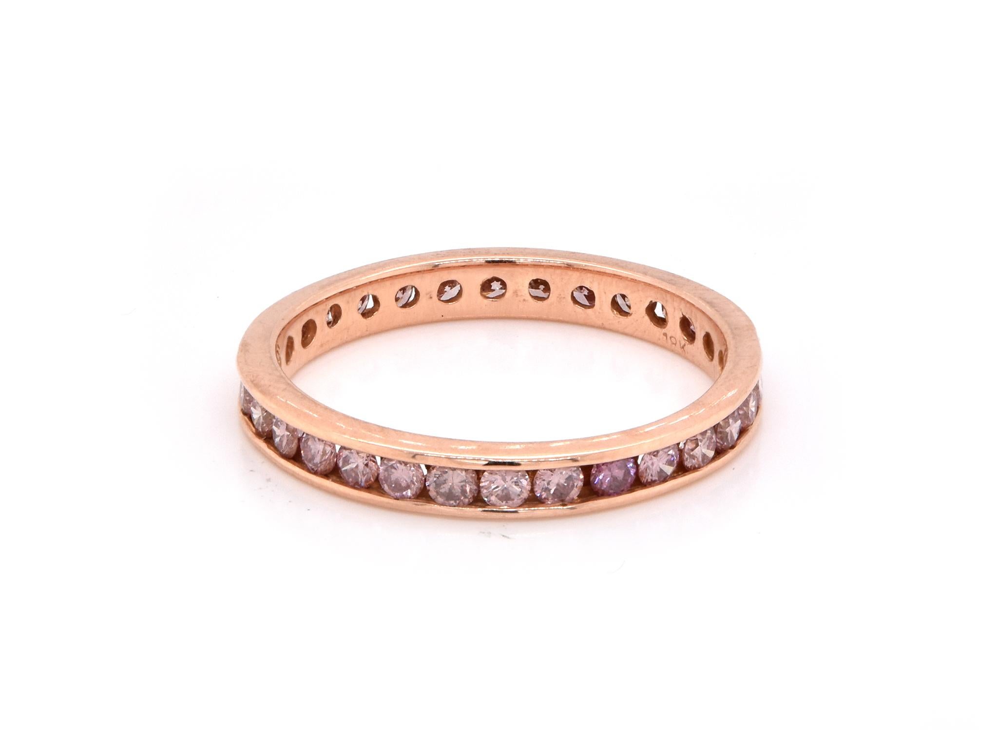 Designer: Custom
Material: 18K rose gold
Diamonds: 30 round cut = .90cttw 
Color: Pink
Clarity: SI1-2
Size: 6.75
Dimensions: ring measures 2.9mm in width
Weight: 1.98 grams
