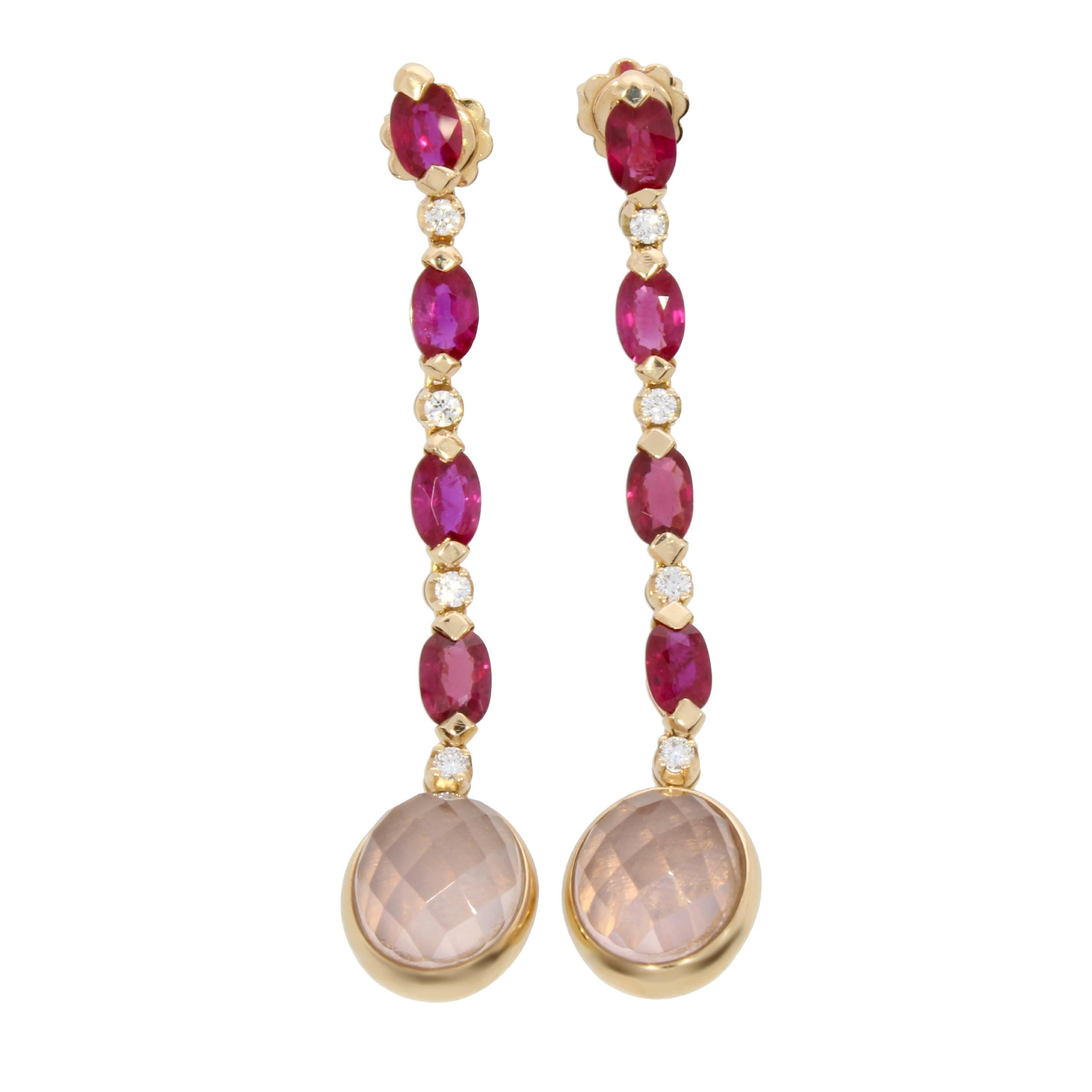 A captivating pair of rotating pink quartz pendants delicately suspended on an elegant arrangement of oval cut rubies and brilliant cut diamonds.

Drop Earrings Venice Collection by Niquesa
18 Rose Gold karat                                         