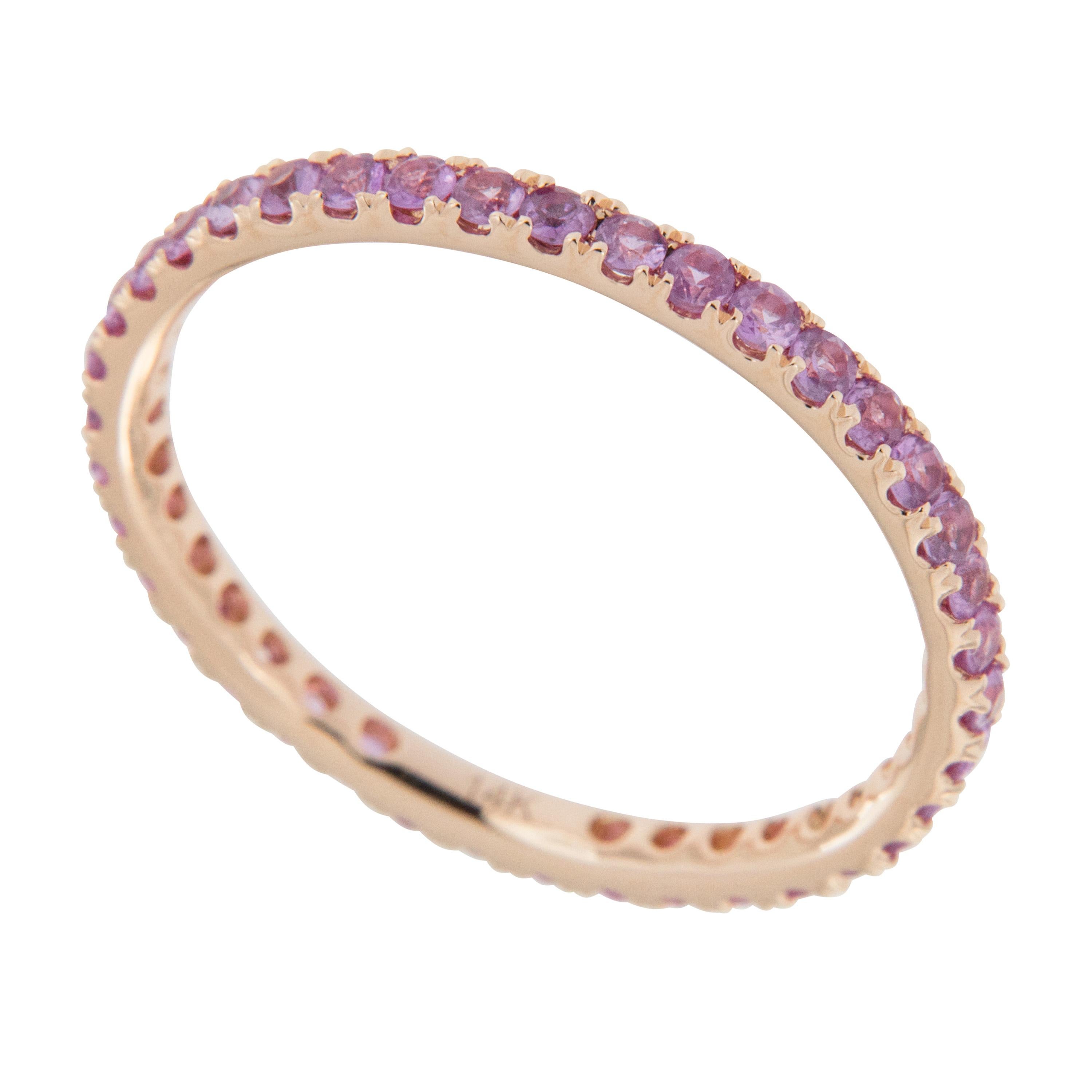 Tickle her pink with this 18 karat rose gold pink sapphire eternity ring with 39 sapphires = 0.59 Cttw in a size 6.25! Sapphire is the birthstone for September and also given as a gem for the 5th, 23rd and 45th wedding anniversaries. This ring looks