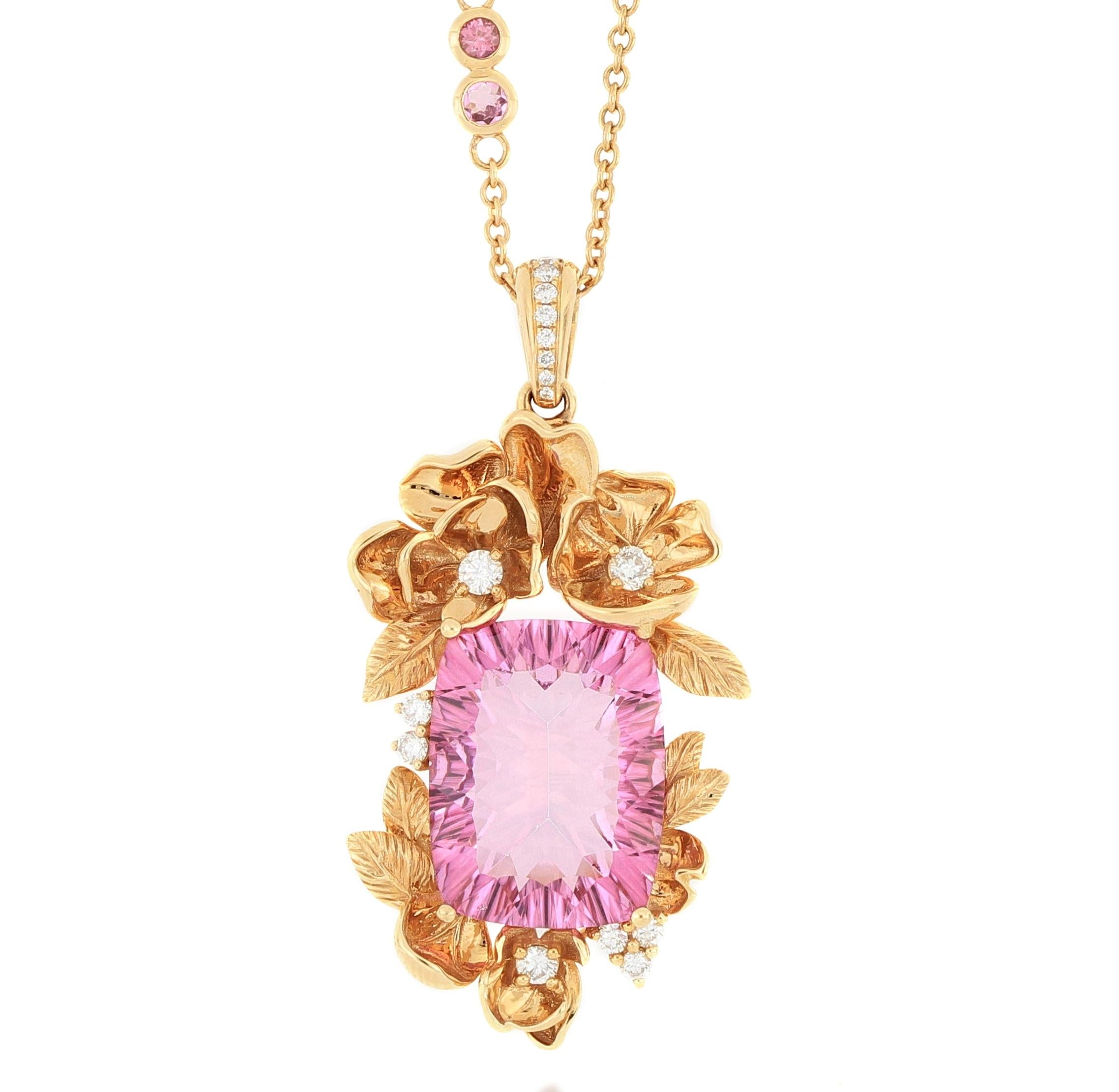 Finely detailed  flower leaves pendant set with an eye catching bright pink topaz weighing 12.7 carats, and brilliant diamonds, mounted in 18 karat rose gold. It comes with a necklace necklace decorated with brilliant diamond and pink
