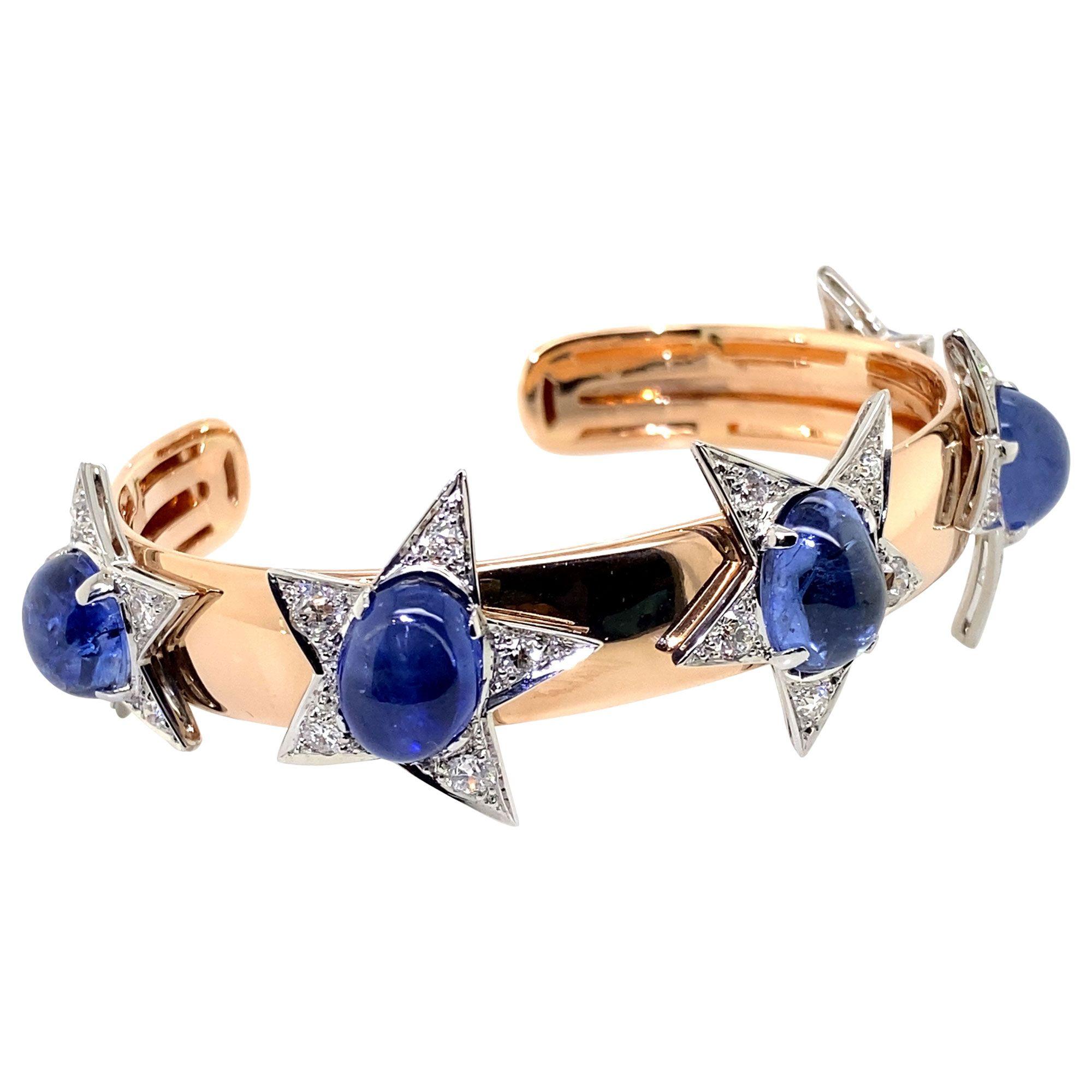 Recreating old world charm into modern 21st century jewels with these beautiful cabochon cut blue sapphire & diamond stars, which were a brooch in a previous life. Pulled from the heavens they have landed on this finely crafted 18k rose gold cuff. 