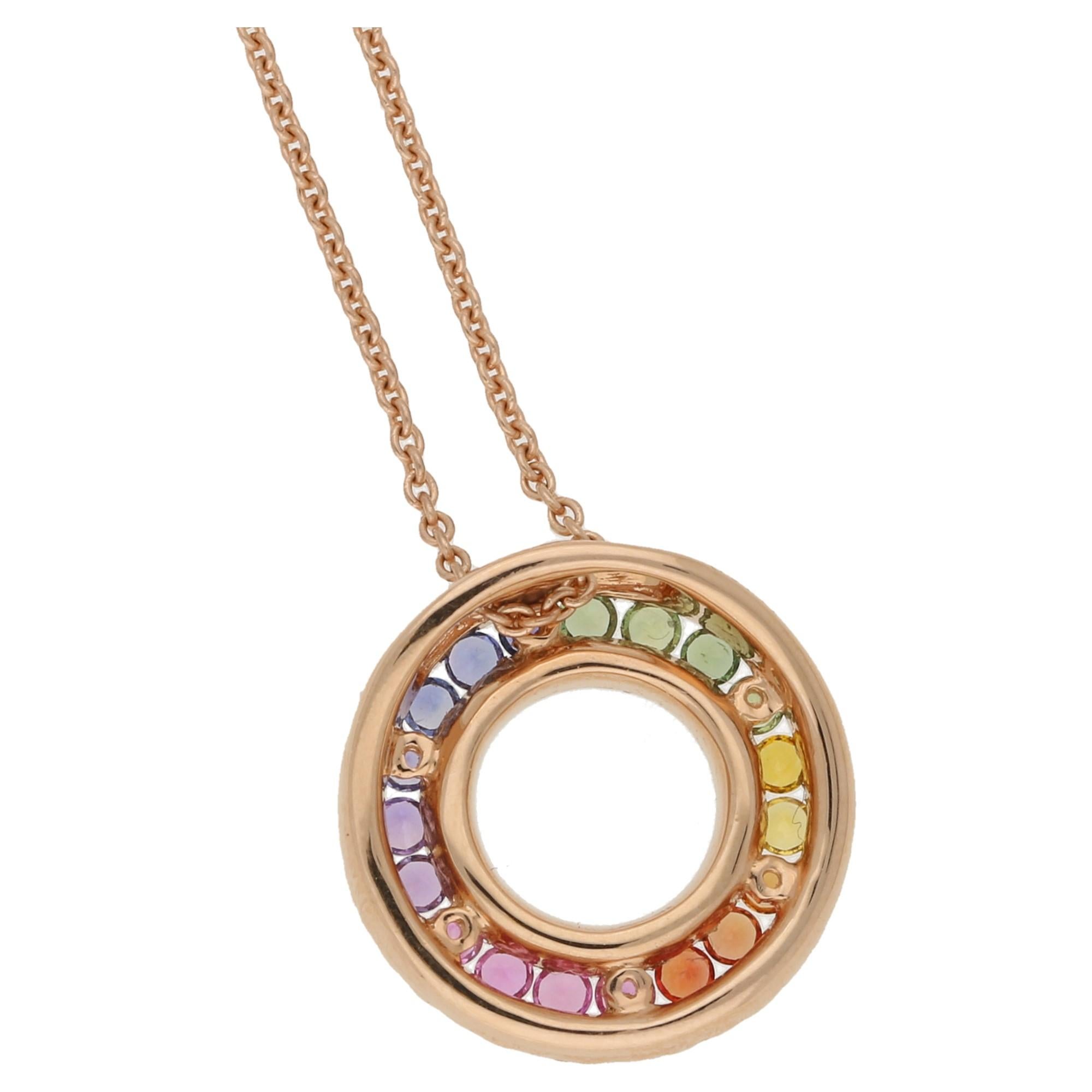 A beautiful rose gold pendant on chain. The pendant is made from a gorgeous array of rainbow sapphires, these total 0.47ct's. These are complimented by 0.33ct's of round brilliant diamonds running in two rows either side of the sapphires. The chain