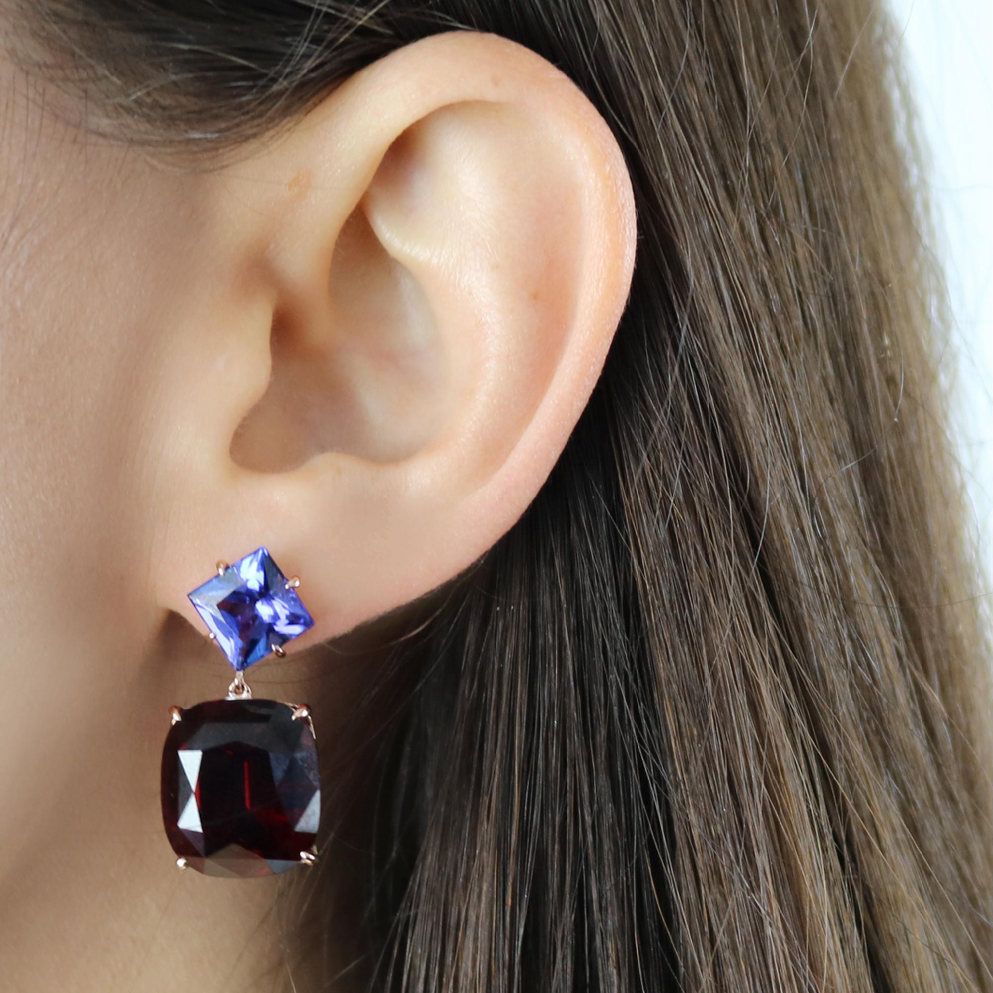 One of a kind cushion shape rhodolite garnet earrings and emerald cut tanzanite set in 18kt rose gold.

Another example of modern gemstone cutting paired with Old World facet alignments is the feature of this pair of everyday earrings.

Well