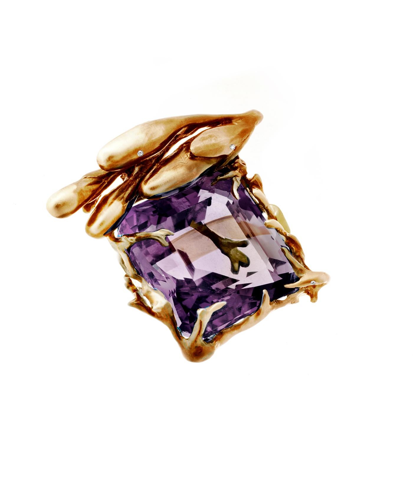 This Fairy Tale ring in 18 karat rose gold with diamonds and huge amethyst (cushion cut) was featured in Vogue UA published issue (in the version with the blue topaz). It is a jewellery by artist, designed by the oil painter Polya Medvedeva, who's