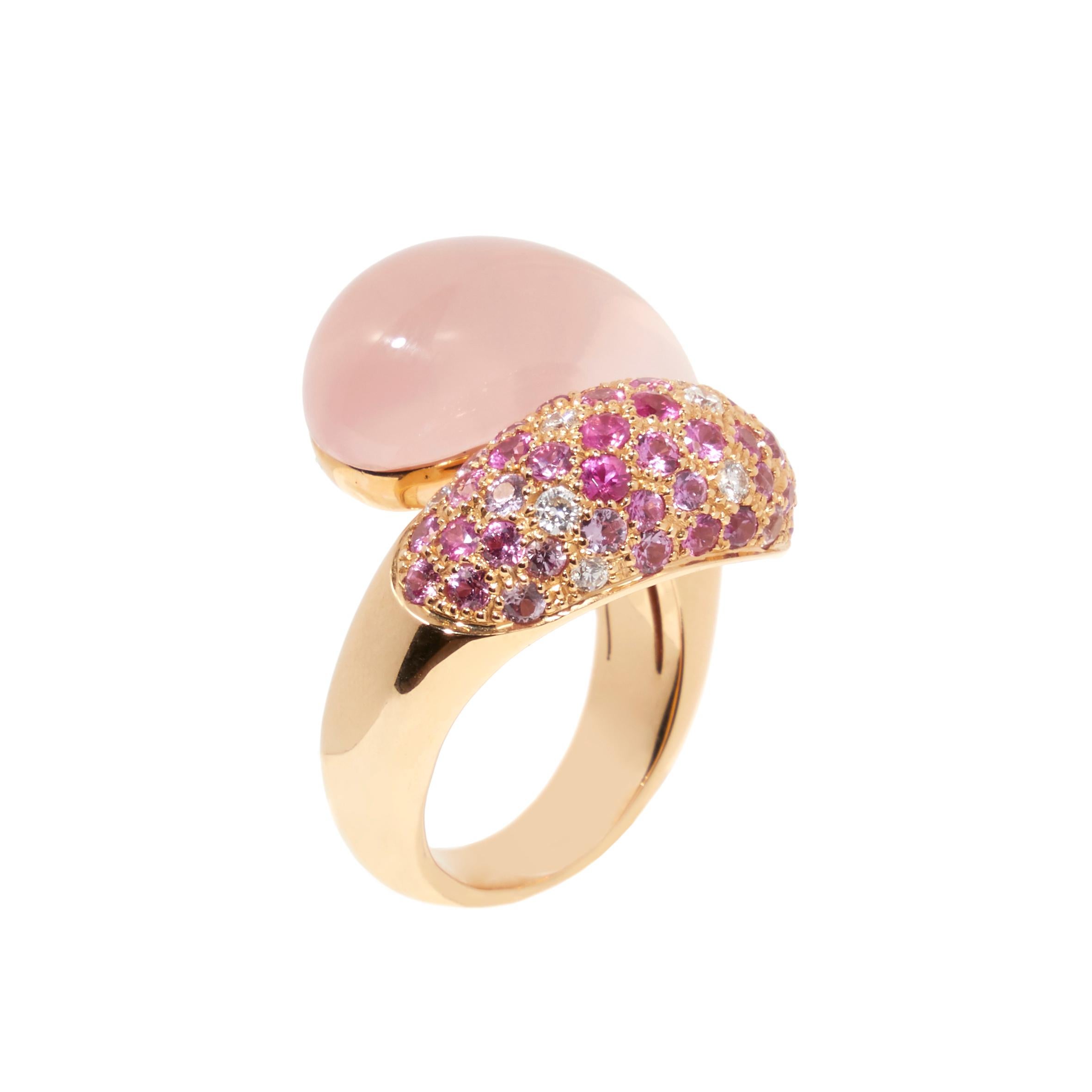 One-of-a-kind Design in Pink Gold with Rose Quartz, Diamonds, and Pink Sapphires

The ring crafted in 18 karat pink gold features a unique design known as ‘wokkel’ in Dutch. The rose quartz gemstone is sculpted into a rounded shape that complements