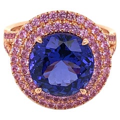 18 Karat Rose Gold Round Cut Tanzanite and Pink Sapphires Halo Cocktail Ring 18 Karat Rose Gold Round Cut Tanzanite and Pink Sapphires Halo Cocktail Ring