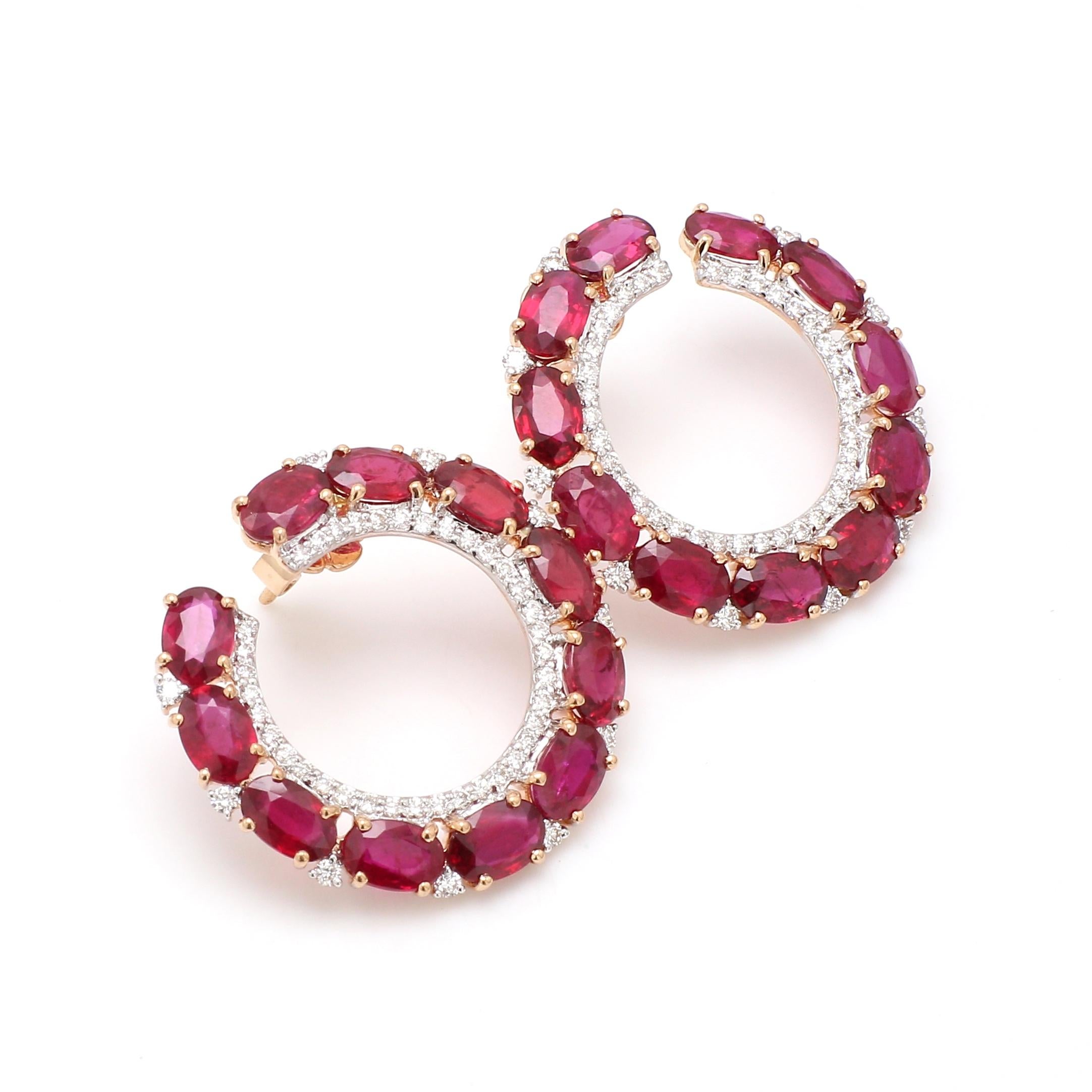18 Karat Rose Gold Ruby and Diamond Contemporary Hoop Earrings

A vivid refined take on hoops; this frontal hoop style is intricately designed comprising of beautiful fiery red color rubies with the added layer of pave diamonds elegantly set in 18k
