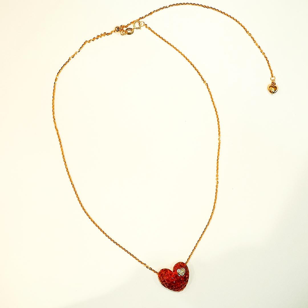 Moderne Pendentif en forme de cœur en or rose 18 carats, rubis et diamants, monture invisible en vente