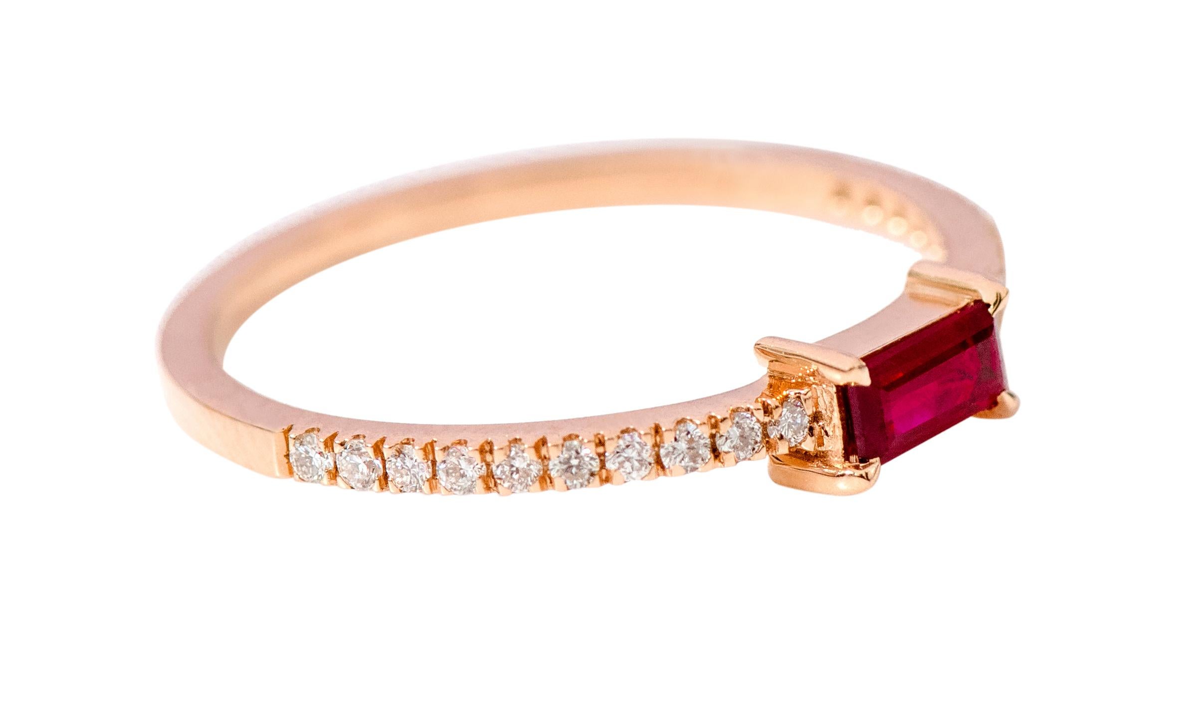 18 Karat Rose Gold Ruby and Diamond Solitaire Eternity Band Ring

This incredible pigeon blood red ruby and diamond ring is sensational. The solitaire baguette cut ruby in eagle prong box setting in rose gold is perfect. The thin band of half