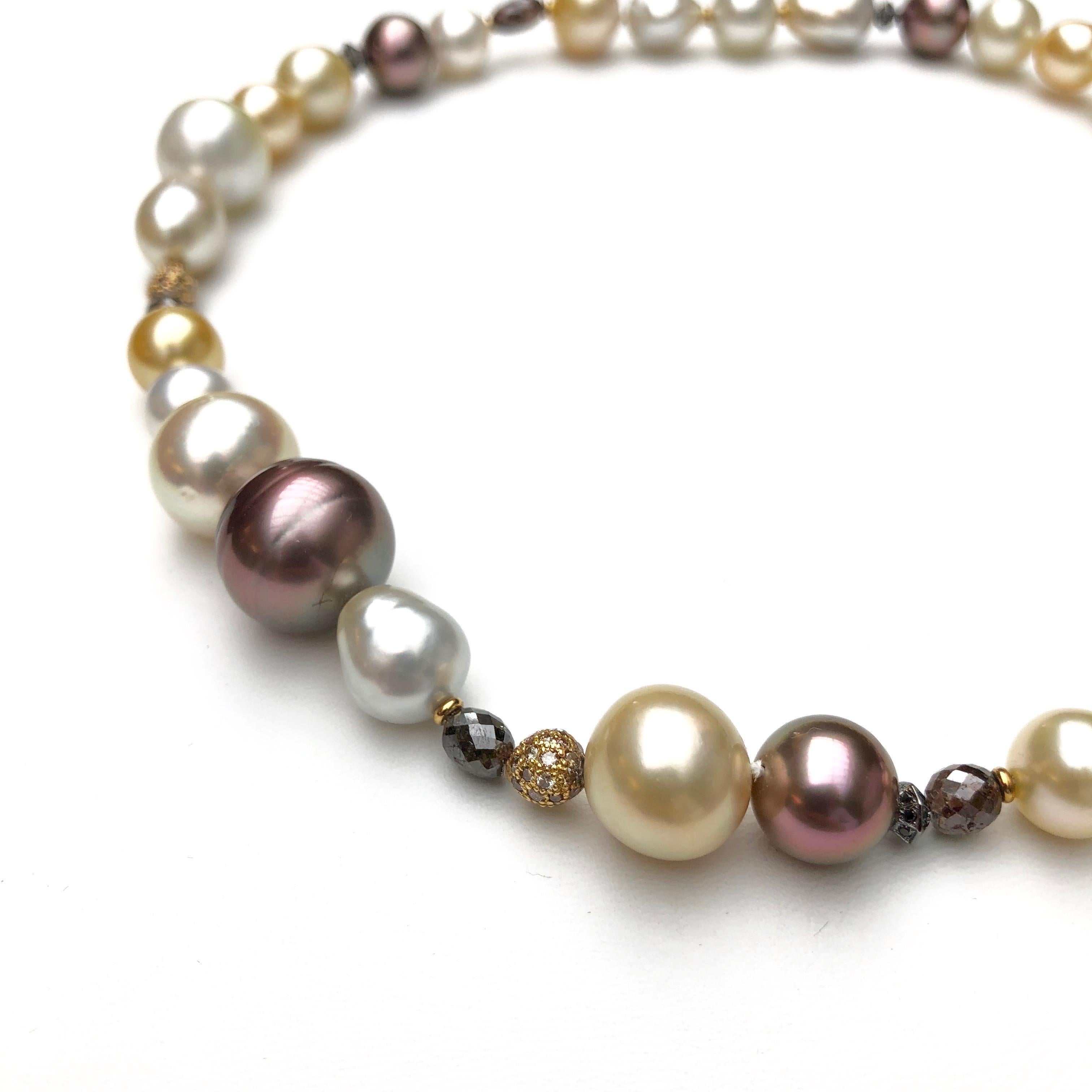 What an warm, rich and bright color combination.
25 different South Sea Cultured Pearls plus 6 brown Tahitian Cultured Pearls
18 ct. of burgundy colored , fine facetted diamonds
plus 42 tiny black heated diamonds and 136 brown diamonds. 
A beautiful
