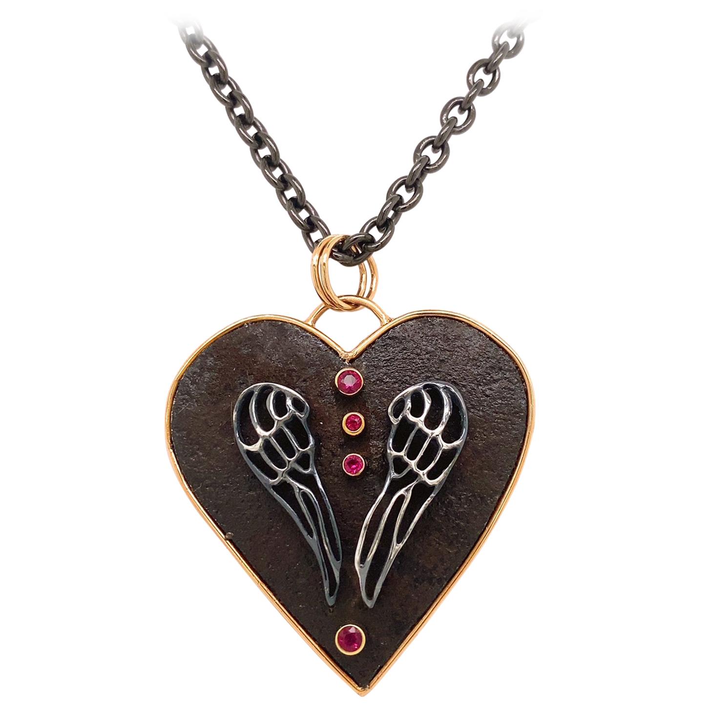 18 Karat Rose Gold, Sterling Silver, and Rusted Iron Heart Necklace with Rubies