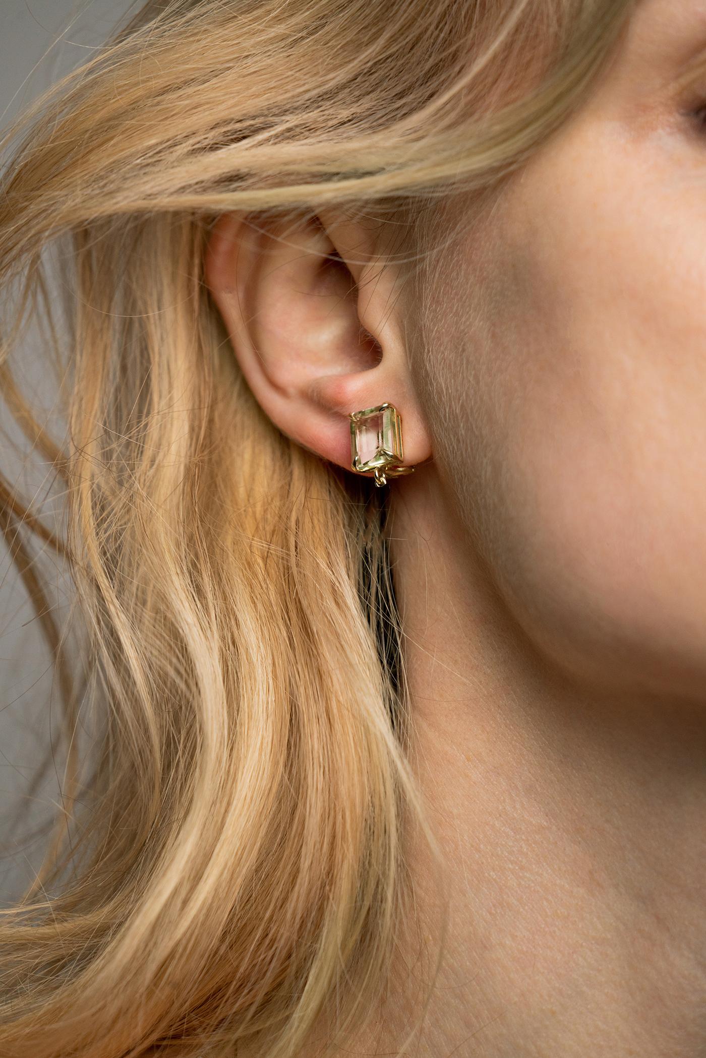 These contemporary transformer drop stud earrings are made of 18 karat rose gold with detachable natural amethyst drops and mint quartzes (prasiolites), and two round diamonds. The earrings are 1,3 inches (33 mm) long. We use top natural diamonds