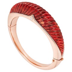 Armband aus 18 Karat Roségold, weißen Diamanten und geschnitzten Korallen