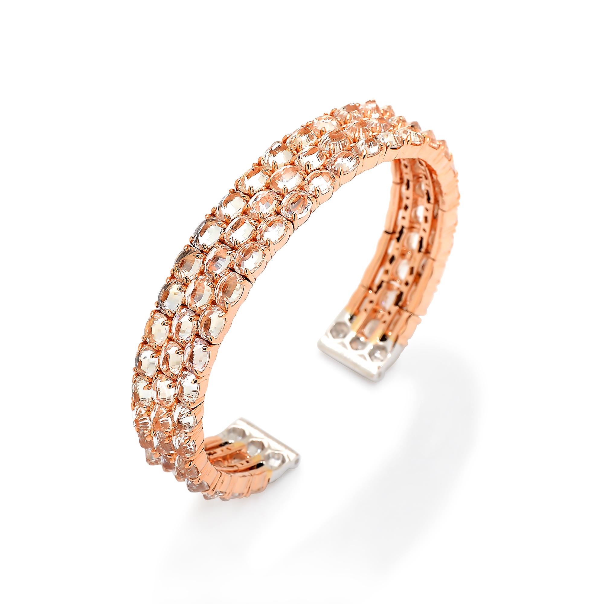 From the Ombre Collection, white sapphire flexible cuff bracelet with pave-set round, brilliant diamonds in 18 karat rose gold. 

Reimagined from summers spent at the Tuscan shore, the Ombre Collection highlights the diverse hues and textures found