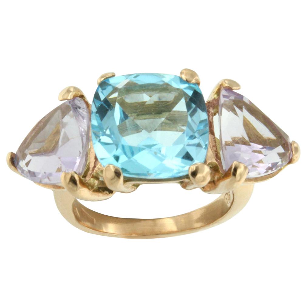 18 Karat Rose Gold with Blue Topaz and Amethyst Ring For Sale