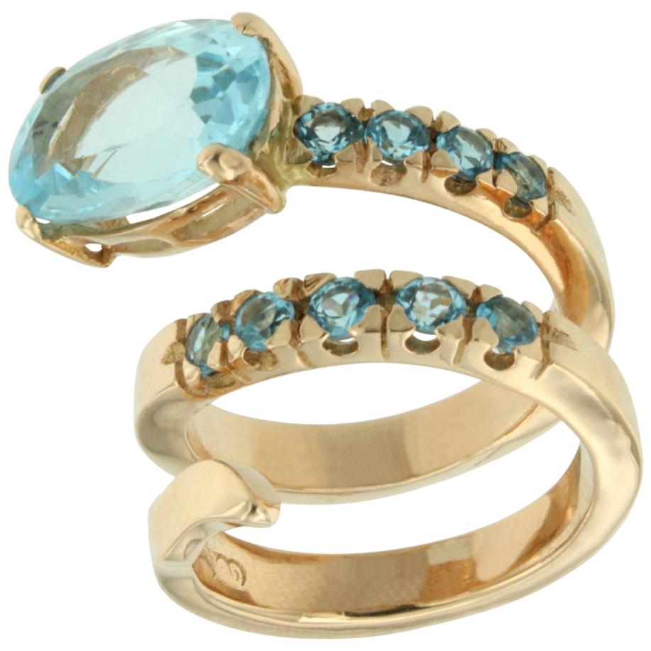 18 Karat Rose Gold with Blue Topaz Ring For Sale