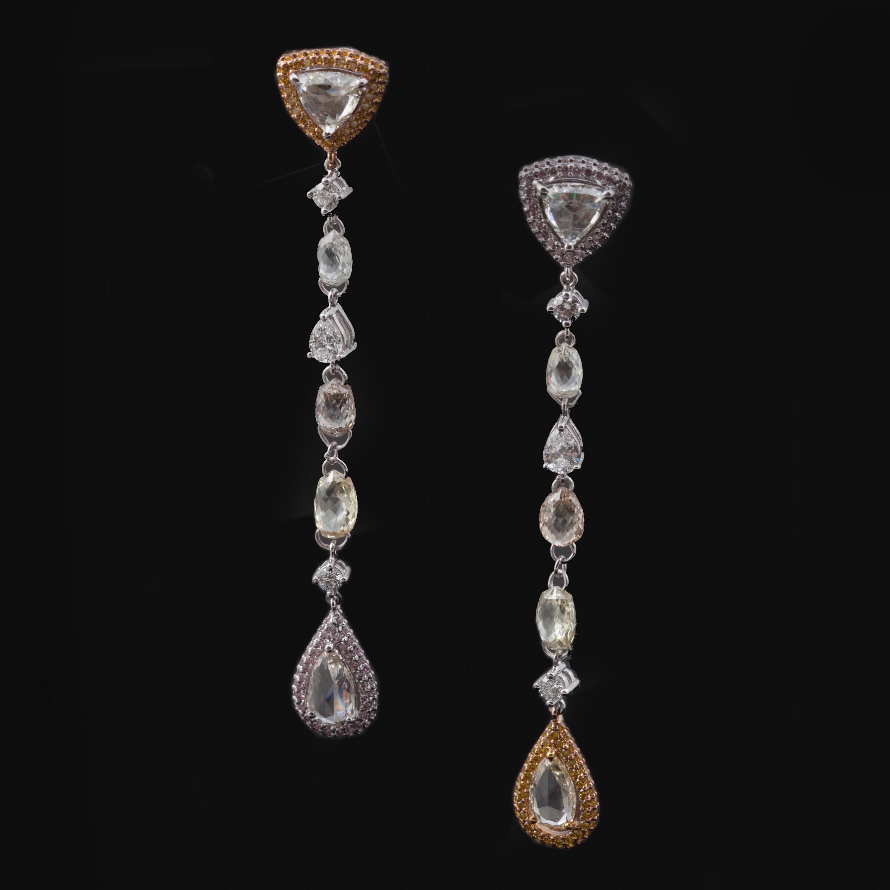 These spectacular earrings are inspired by a play on words derived from a natural phenomenon. Big Rock Candy Mountain is as much an inspiration as the rock formation of yellows, oranges, reds, and whites that inspire these earrings and lent this