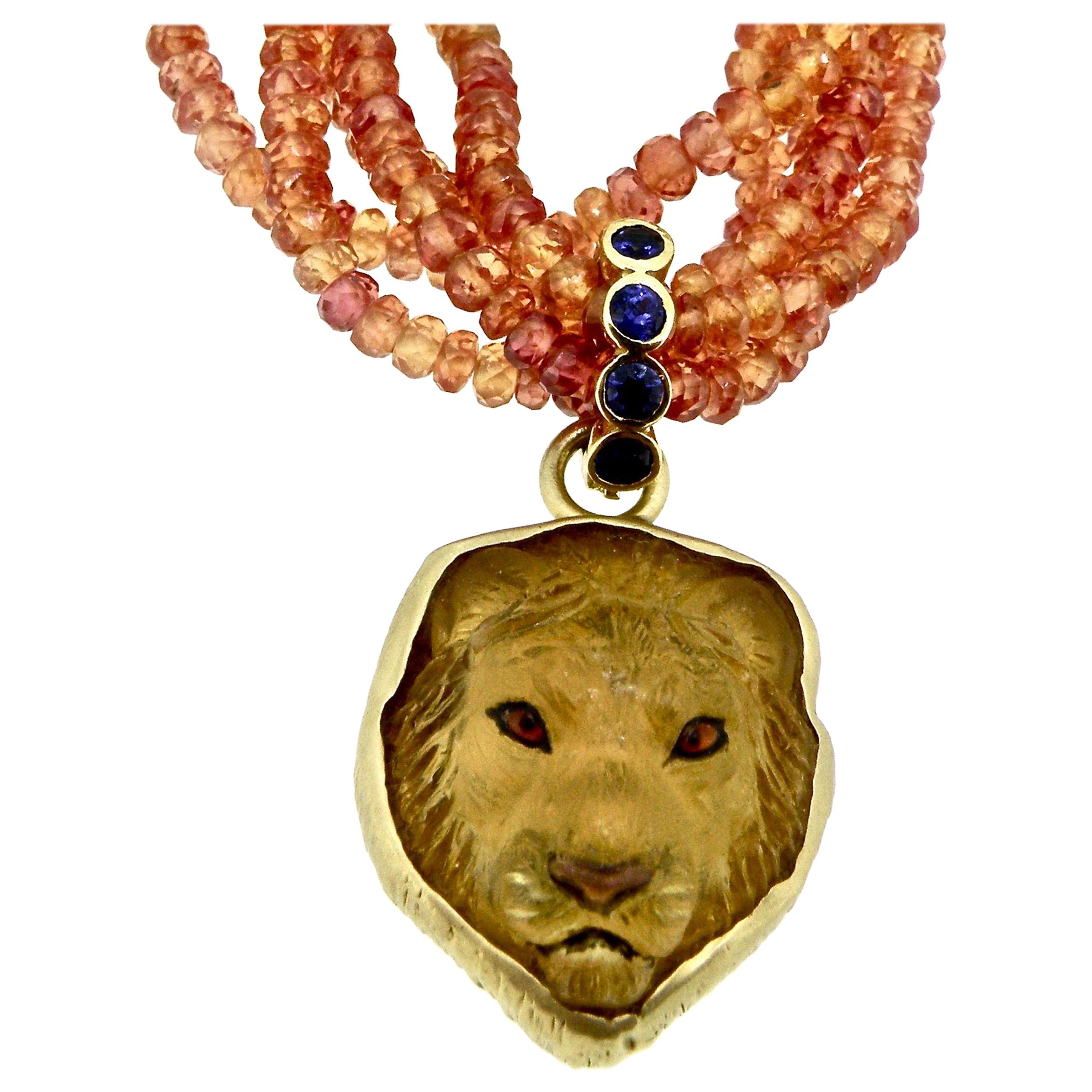 18 Karat Sapphire and Citrine Hand Carved Lionshead Pendant For Sale