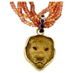 Pendentif tête de lion sculpté à la main en saphir et citrine 18 carats