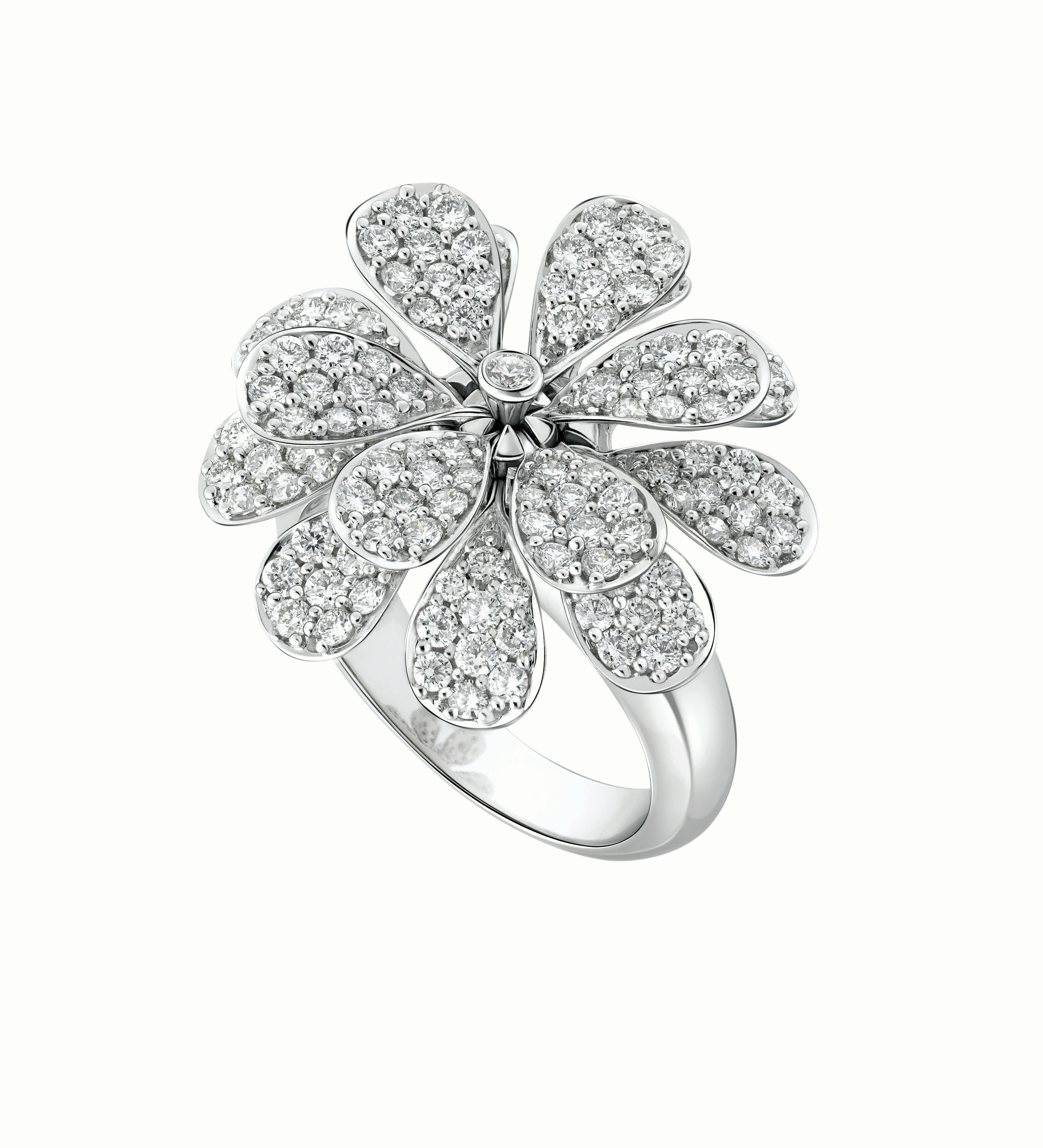 The Secret Garden collection by Hueb is inspired by the flowers that bloom in all its wilderness in the tropical gardens of Brazil. The ring showcases closely set leaves of a flower that spurt from a gold band at the center of the ring. Set in 18K