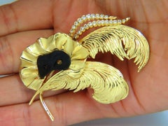 18 Karat Signed 1.00 Carat Diamonds Theater Eye Mask Feather Peacock Deco Brooch